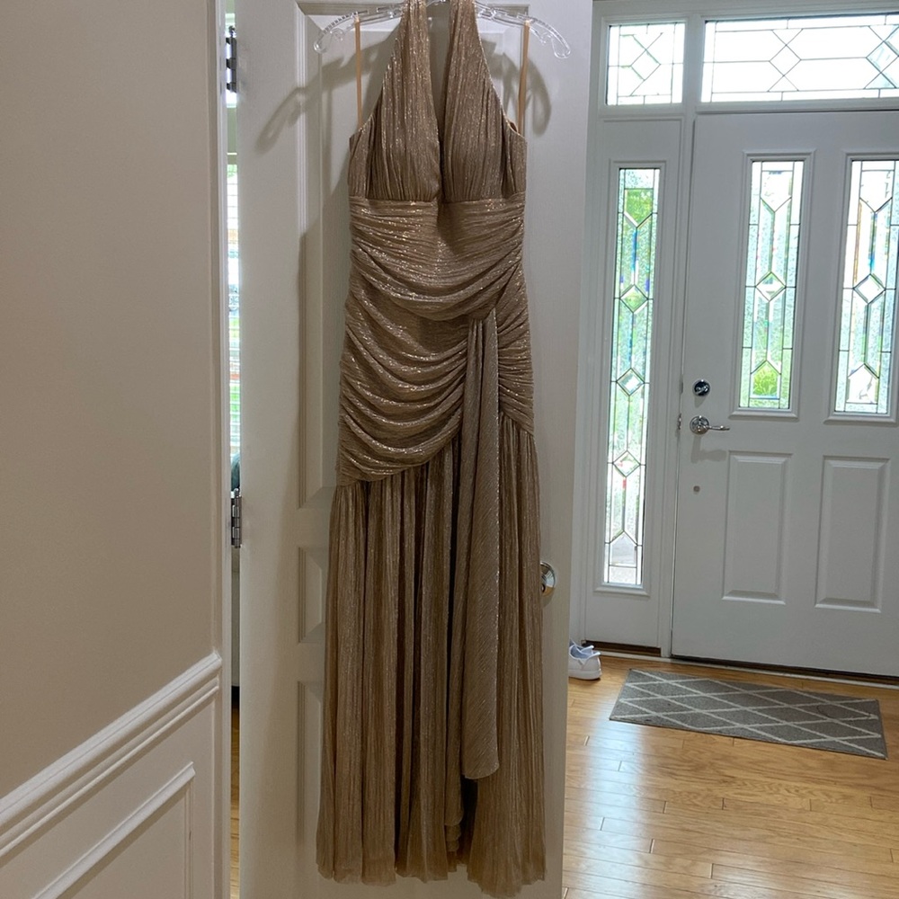 Gorgeous metallic gold gown by BCBGMAXAZRIA